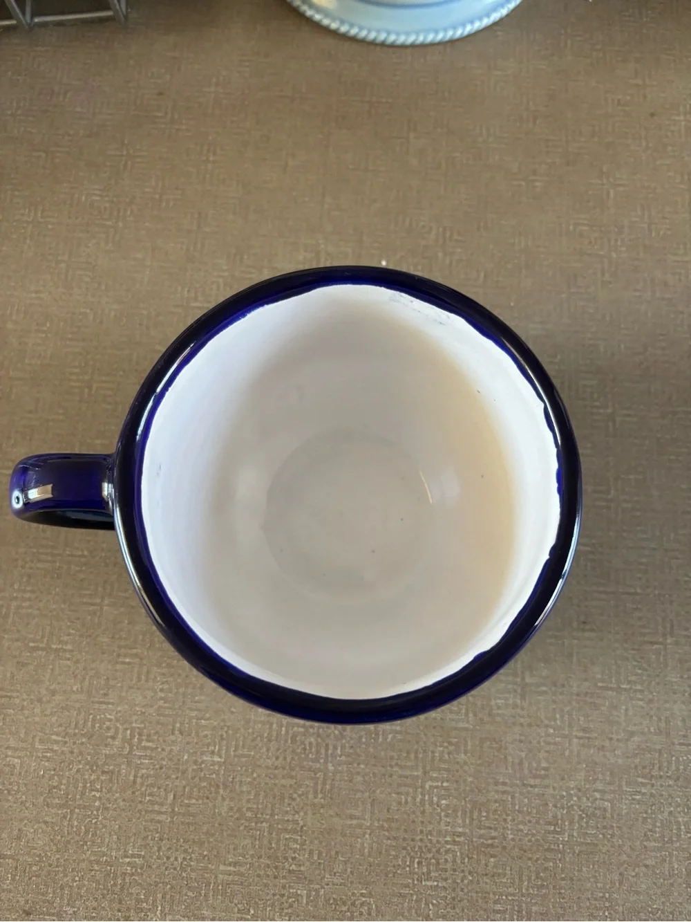 Hand-Painted Blue and White Floral Ceramic Cup